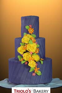 Purple Drapes Wedding Cake - Triolo's Bakery